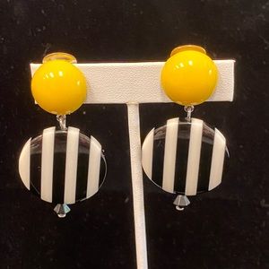 Angela Caputi yellow, w/ black & white strip 2.5”x1.25” dangle, clipon earrings
